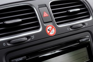 No Smoking sign on car dashboard